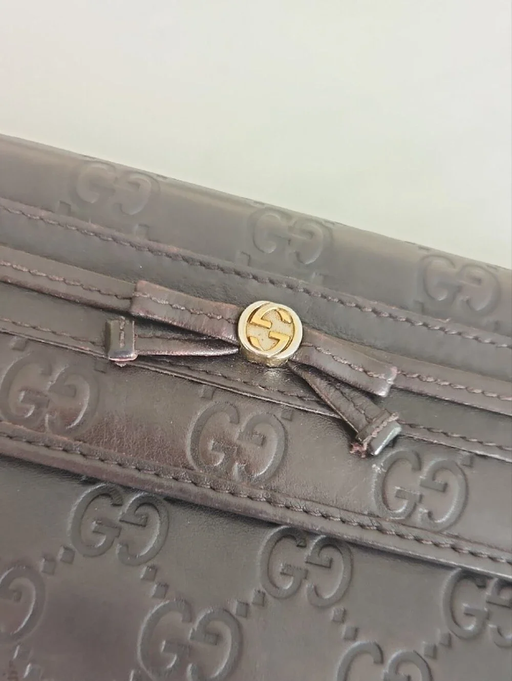 Gucci Black Embossed GG Continental Wallet with Bow Detail. Perfect FALL color